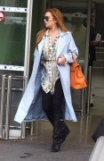 Lindsay Lohan - arriving at the airport in Nice, France 4/03/2015