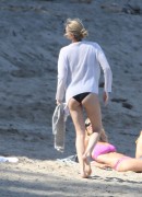 Charlize Theron - wearing a swimsuit at a beach in Malibu 04/12/2015